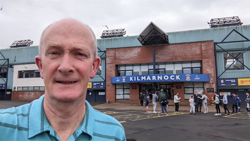 Self portait photo in front of the entrance to Kilmarnock Football Club ground
