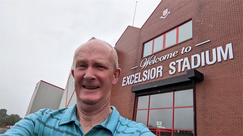 Self portait photo in front of the stadium at the Airdrieonians Football Club ground